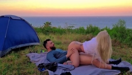 Blonde chick opens her mouth and gives oral foreplay before Camping Sex