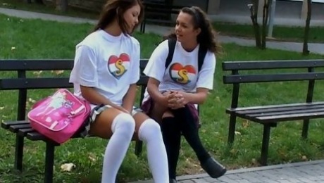 Two saucy teen dykes please one another on a bed in a hot lesbo fuck video