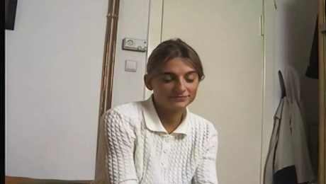 girl from the street undresses in hotel room