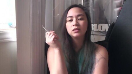 Miss Dee Nicotine having her morning Cigarette